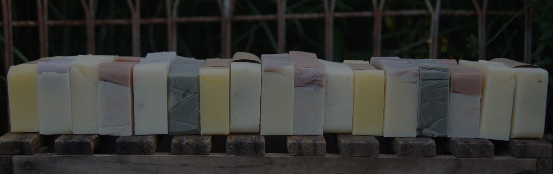 image of natural made soaps, body butter, essential oils, and lip balms